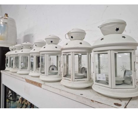 Seven night light lit lanterns