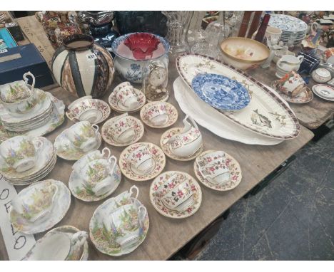 A 19th C. part tea set, another by Royal Albert, a 19th C. cut glass jug, decanters, a Royal Worcester bowl, a fish platter, 