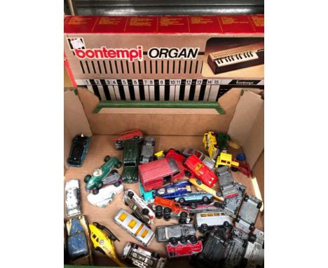 Vintage die-case vehicles and a Bontempi organ.