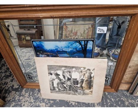 A Rolls Royce mirror and a vintage motocross photograph. 