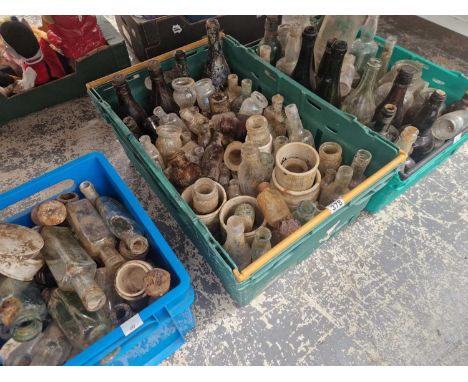 A collection of vintage bottles and jars
