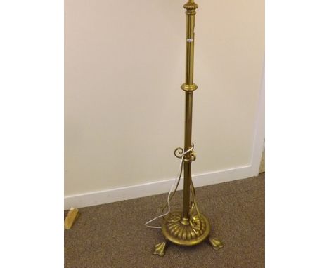 VICTORIAN BRASS STANDARD LAMP ON A SCALLOPED FOOT & BASE EST [£40-£80]