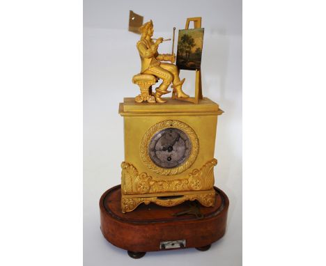 A 19TH CENTURY CONTINENTAL GILT METAL CASED MANTLE TIMEPIECE OR CLOCK, the case in the form of a classical plinth surmounted 