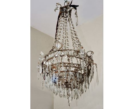 A REGENCY STYLE WATERFALL HANGING LIGHT FITTING with concentric rings and with hanging glass drops, supported by chains of dr