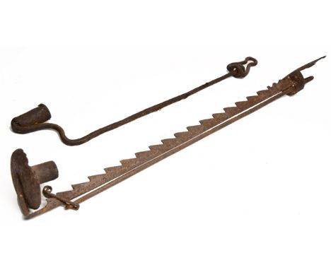 AN 18TH CENTURY WROUGHT IRON LOOM LIGHT with suspension ring, 47cm high together with a, possibly 18th century, ratcheted wro