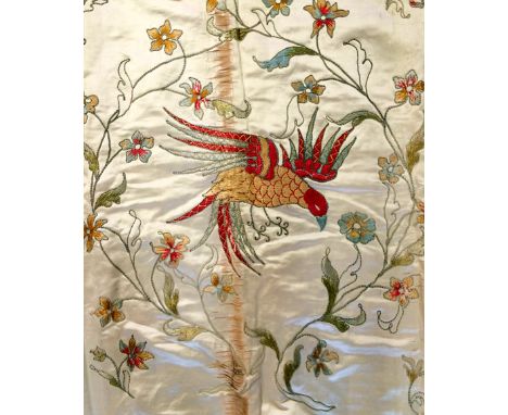 A PAIR OF EDWARDIAN SILK CHINOISERIE STYLE EMBROIDERED SILK CURTAINS, cream silk with a beaded and embroidered floral design 