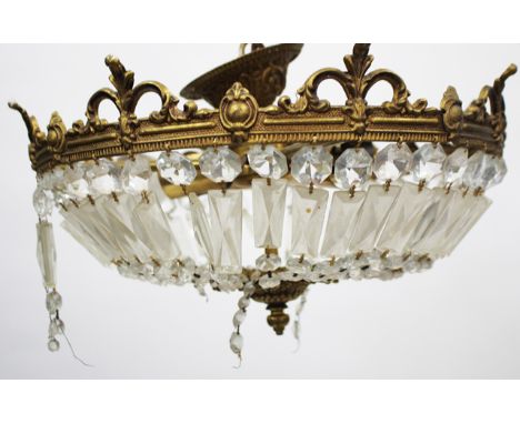 A GILT METAL MOUNTED BAG TYPE LIGHT FITTING with cut glass drops, 41cm diameter