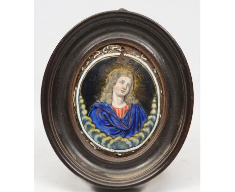 ATTRIBUTED TO NICOLAS LAUDIN (FRENCH, 1629-1698), A LIMOGES ENAMEL OVAL PLAQUE, depicting the portrait of a saint among cloud