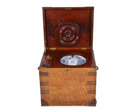 A VICTORIAN SCUMBLED AND IRON BOUND COMMODE BOX with carrying handles to the side, the lid opening to reveal a turned cover a