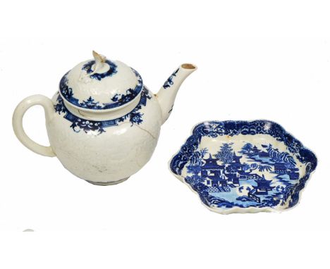 AN 18TH CENTURY WORCESTER BLUE AND WHITE PORCELAIN TEAPOT of bulbous form with a blue crescent mark to the base together with