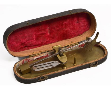 A PAIR OF GEORGIAN BRASS AND STEEL COIN SCALES with coin balance and coin gauge, the oval base stamped ' S.Henry, Inventor' a