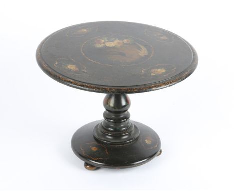 AN EARLY VICTORIAN BLACK LACQUERED TILT TOP MINIATURE CIRCULAR TABLE with turn support and spreading base, the top decorated 