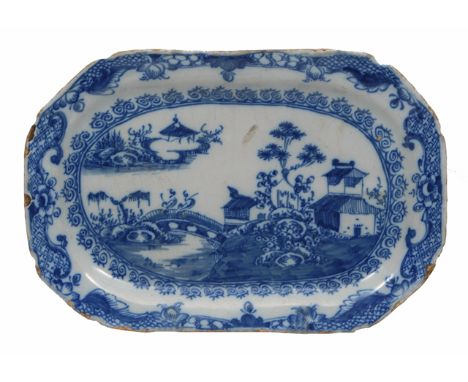 A LATE 18TH/EARLY 19TH CENTURY DELFTWARE SMALL RECTANGULAR DISH with canted corners, decorated with an oriental landscape, 16