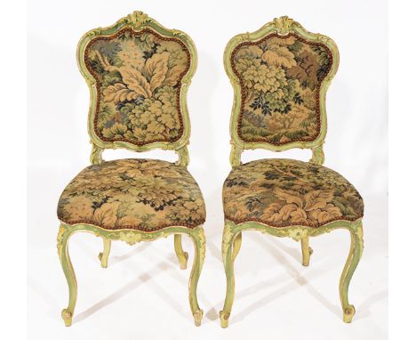 A PAIR OF 19TH CENTURY LOUIS XV STYLE GREEN PAINTED SALON CHAIRS with scrolling backs set with tapestry panels and with match