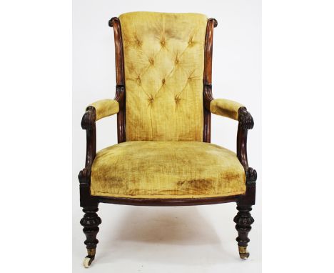 A VICTORIAN ROSEWOOD BUTTON UPHOLSTERED OPEN ARMCHAIR with gold Dralon upholstery, scrolling arms and turned legs terminating