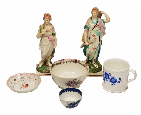 A PAIR OF LATE 18TH/ EARLY 19TH CENTURY POTTERY FIGURES decorated in coloured enamels, one of Diana and the other of a maiden