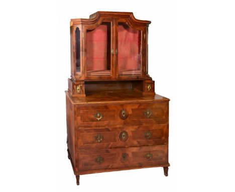 A 19TH CENTURY AUSTRIAN WALNUT AND CROSSBANDED  COMMODE CABINET the upper section with shaped glazed panel doors opening to r