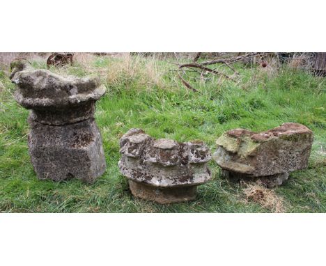 A PAIR OF GOTHIC REVIVAL ARCHITECTURAL STONE PILASTER ELEMENTS and the top and base of a column with crenellated decoration, 