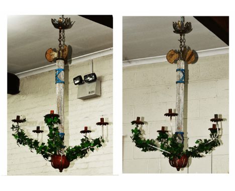 A PAIR OF PAINTED WROUGHT IRON FIVE-LIGHT CHANDELIERS, the central support with Roman style decoration of a cluster of arrows