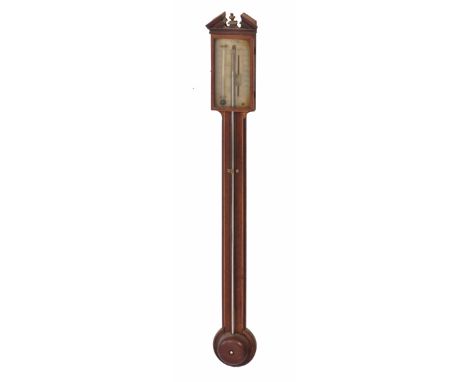 A GEORGE III MAHOGANY STICK BAROMETER, the break pediment with central gilt turned urn finial, the case with ebony and boxwoo