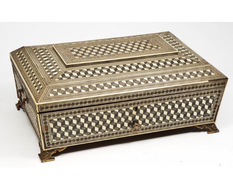 A 19TH CENTURY ANGLO-INDIAN VIZAGAPATAM SEWING BOX of casket form, decorated with ebony, ivory and geometric parquetry decora