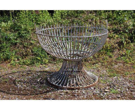 A LARGE SILVER PAINTED WROUGHT IRON PLANTER on a spreading circular base, 107cm diameter