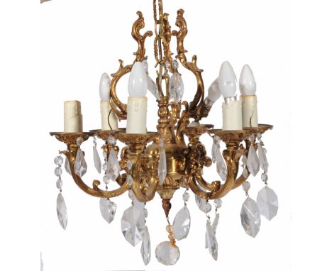 A GILT METAL SIX LIGHT ELECTROLIER with scrolling branches, 43cm high together with another similar (2)