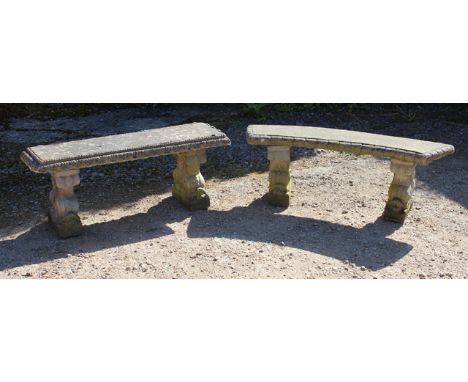 A RECTANGULAR CONCRETE GARDEN BENCH on dolphin supports, 117cm wide together with a curving concrete bench, 135cm wide (2)