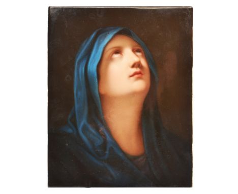 A 19TH CENTURY BERLIN PORCELAIN HAND PAINTED  PLAQUE depicting a head and shoulders portrait of a female saint, 14.5cm wide