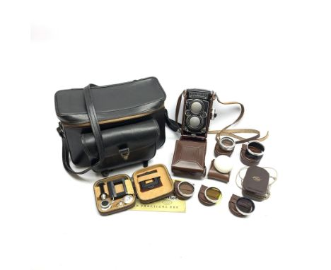 Rolleiflex 2.8F camera in leather case together with; 'In Practical Use' instruction manual, Rolleipol -1.5 lens in case, Rol