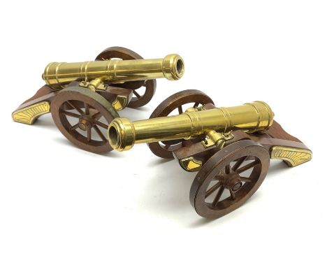 Large pair of 20th century brass model cannons, each on brass mounted mahogany carriage with coopered spoked wheels L39cm - C
