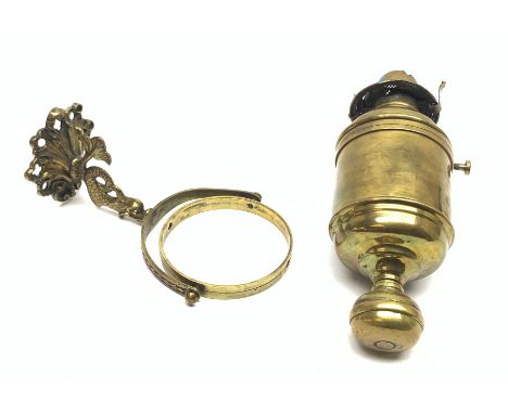 Ship's bulkhead mounting brass oil lamp of drum shaped form, gimbal mounted on dolphin shaped bracket H27cm - Condition Repor