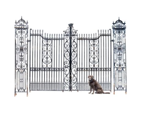 Architectural: An impressive pair of Georgian style wrought iron gates  last quarter 19th century the gates surmounted by an 