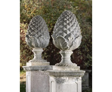 Garden Statuary: A pair of composition stone gate pier pineapples  2nd half 20th century  90cm high 