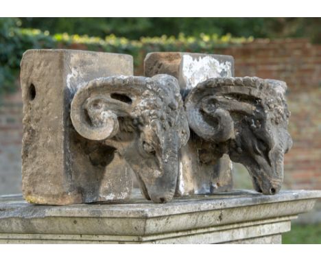 Garden Statuary: A pair of Victorian carved stone architectural features carved in high relief with rams’ heads  late 19th ce