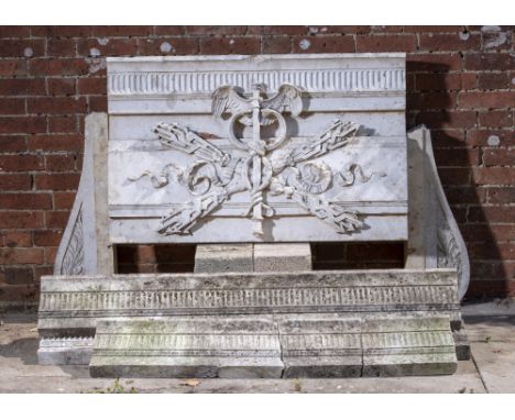 Architectural: A carved Travertine marble frieze plaque  2nd half 19th century carved with thunderbolts and a caduceus flanke