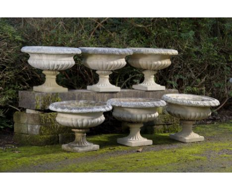 Planter: A similar set of composition stone urns    (similar to lot 306)