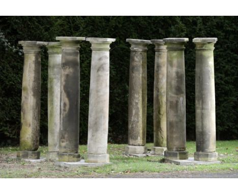 Architectural: A similar pair of carved sandstone column pedestals 