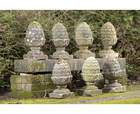 Garden Statuary: A similar set of four composition stone gate pier pineapples