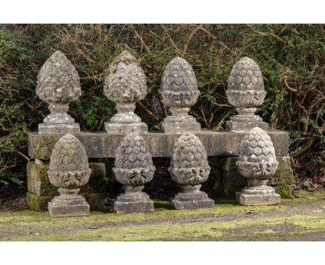 Garden Statuary: A similar set of four composition stone gate pier pineapples