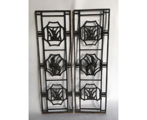 Architectural: A pair of Art Deco pierced cast iron rectangular panels  95cm by 30cm wide together with a pair of late Victor