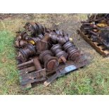 Quantity miscellaneous Caterpillar track rollers and parts
