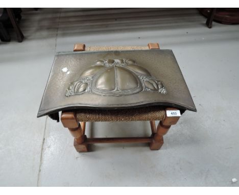 A vintage brass fire canopy and seagrass stool