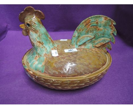 A vintage Majollica style ceramic hen nest