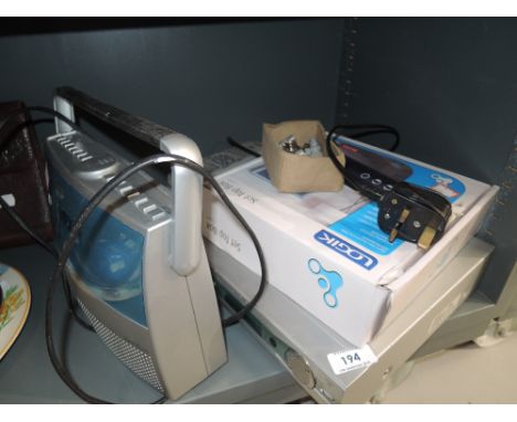 A selection of vintage electronics including set top box and dvd player