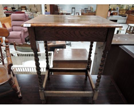 A vintage oak table with twist legs