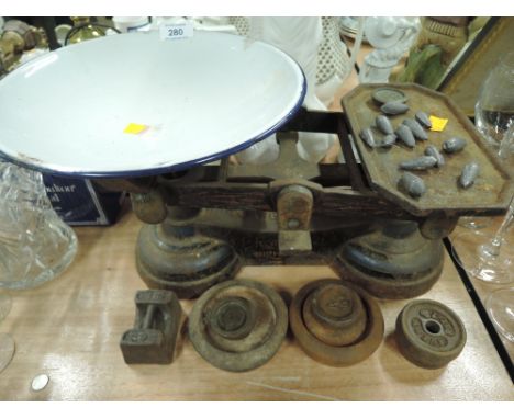 A vintage balance scale set by P Rogers & Co