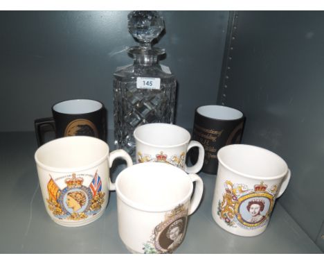 A selection of coronation ware and a glass decanter