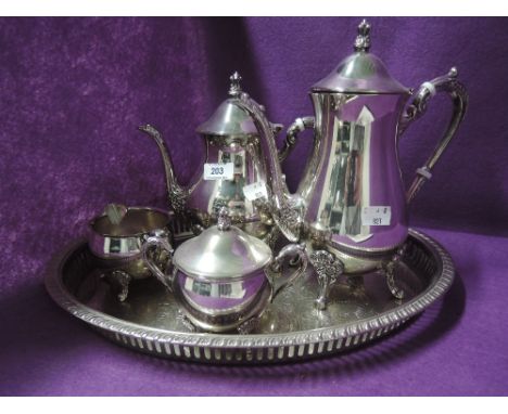 A vintage plated tea set marked MR to base