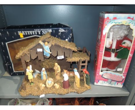 A vintage nativity crib and figure set